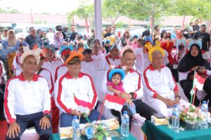 Bupati Asahan, H. Surya, Hadiri Peringatan Hari Anak Nasional