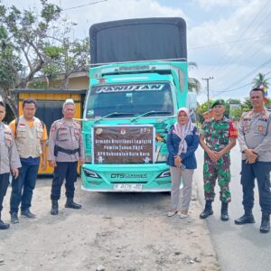 Kapolsek Indrapura Kawal Pergeseran Logistik Pemilu dari PPK Laut Tador ke Gudang KPU Batu Bara.